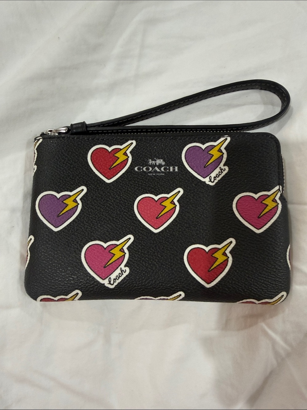 Coach Black Wristlet with Pink & Purple Lightning Heart Motif